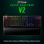Razer Huntsman V2 with clicky purple optical switches, bright Chroma lighting, and dedicated media controls.